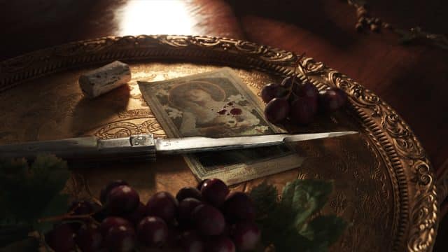 mafia : la deluxe edition vaut elle le détour ? découvrez le Couteau, raisins et carte sur un plateau en cuivre.