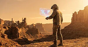 Figure in futuristic gear in a post-apocalyptic desert canyon, looking at a glowing holographic '100' reward. Warm light.