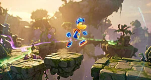 Rayman portant une tenue bleue et orange saute entre des plateformes en pierre dans un environnement 3D luxuriant.