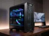 Meilleur boitier PC gaming 2026 : quel châssis pour votre config ? Boîtier PC gaming haut de gamme avec éclairage RGB, posé sur un bureau en bois devant un écran incurvé.