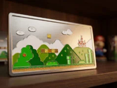 Obtenez la plaque métallique Super Mario World collector Plaque métallique gravée représentant un niveau classique de Super Mario World avec un château et des tuyaux verts.