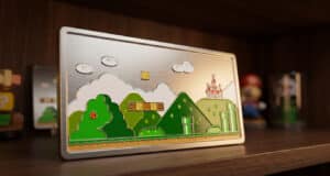 Plaque métallique gravée représentant un niveau classique de Super Mario World avec un château et des tuyaux verts.