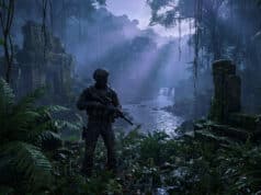 Ghost recon wildlands last rites : le choc 4K/60 FPS est là Un soldat lourdement armé dans une jungle dense avec des ruines antiques et une cascade en arrière-plan.