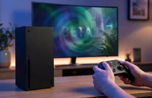 Jeux gratuits xbox week-end : cinq titres à découvrir Console Xbox Series X posée sur une table avec une personne jouant sur un écran affichant un jeu en version bêta.