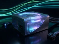 Quelle alimentation choisir pour un PC gaming en 2026 ? Bloc d'alimentation pour PC gaming haut de gamme avec éclairage LED RGB et design futuriste sur fond noir.