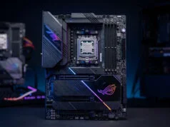 Quelle est la meilleure carte mère AM5 pour le gaming ? Carte mère ASUS ROG haut de gamme avec socket AM5 et processeur AMD Ryzen monté, sur un fond sombre.