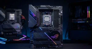 Carte mère ASUS ROG haut de gamme avec socket AM5 et processeur AMD Ryzen monté, sur un fond sombre.