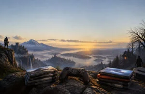 Manette de jeu et piles de jeux vidéo posées sur un rocher devant un paysage montagneux fantastique au coucher du soleil.