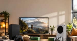 Consoles Xbox Series X et S sur une table basse devant un écran affichant un paysage montagneux.