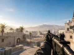 Comment optimiser ses FPS sur CS2 en 2026 Vue à la première personne dans Counter-Strike 2, montrant une arme et une architecture urbaine de style désertique.